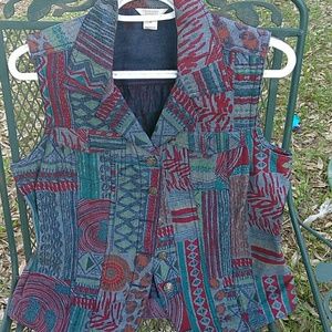 Vest, its a medium but could fit a large.